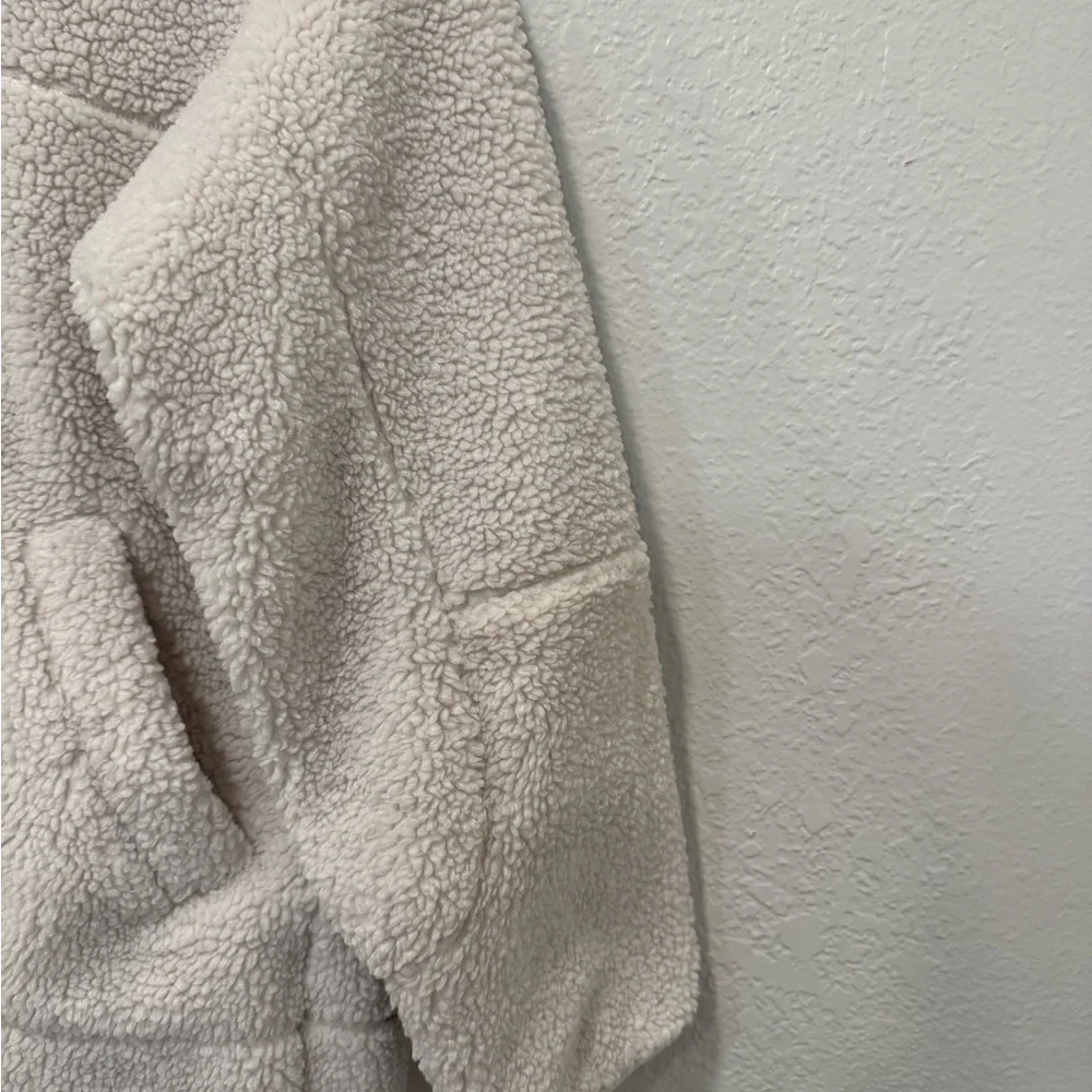 Lululemon Collarless Textured Fleece Full Zip jacket in the color White Opal